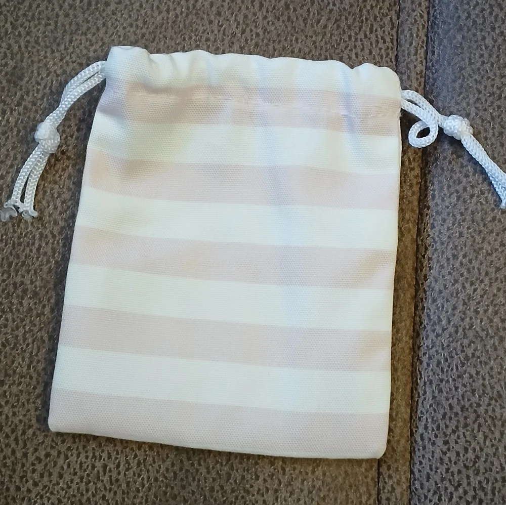 Rongrong DeVoe canvas cinch tie bag for jewelry, makeup pink stripes